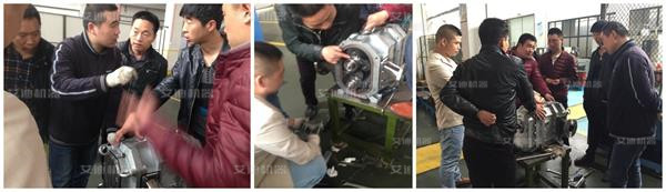 尊龙凯时机器技术人员指导学员.jpg